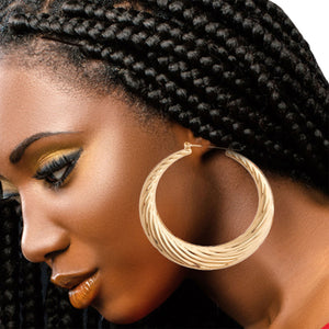 Open image in slideshow, Gold Wave Hoop Earrings
